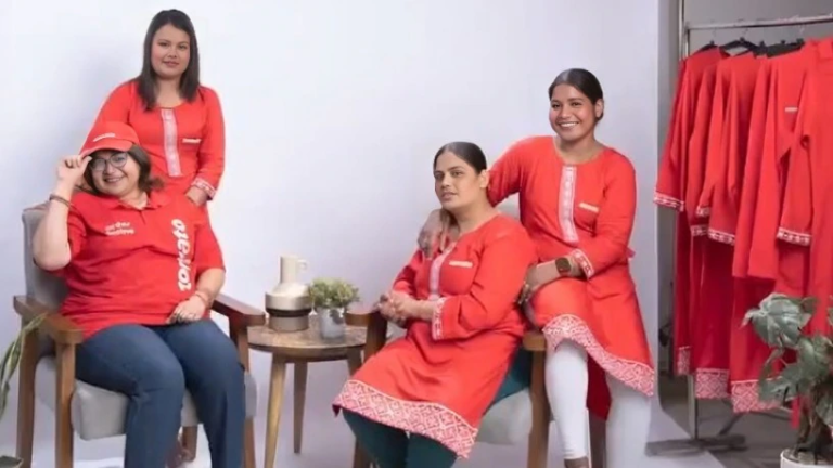 Zomato Women Kurta for Female Delivery Partners On the Occasion Of Women’s Day An image showing female employee wearing zomato women kurta