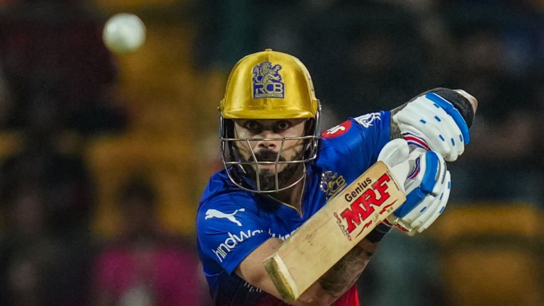 Image showcasing Virat Kohli's expression while hitting the boundary; he has an amazing contribution of 77 runs. Otherwise, the win would not have been possible against PBKS.