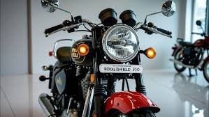 Royal Enfield Bullet 350 in Military Red color cruising on open highway"